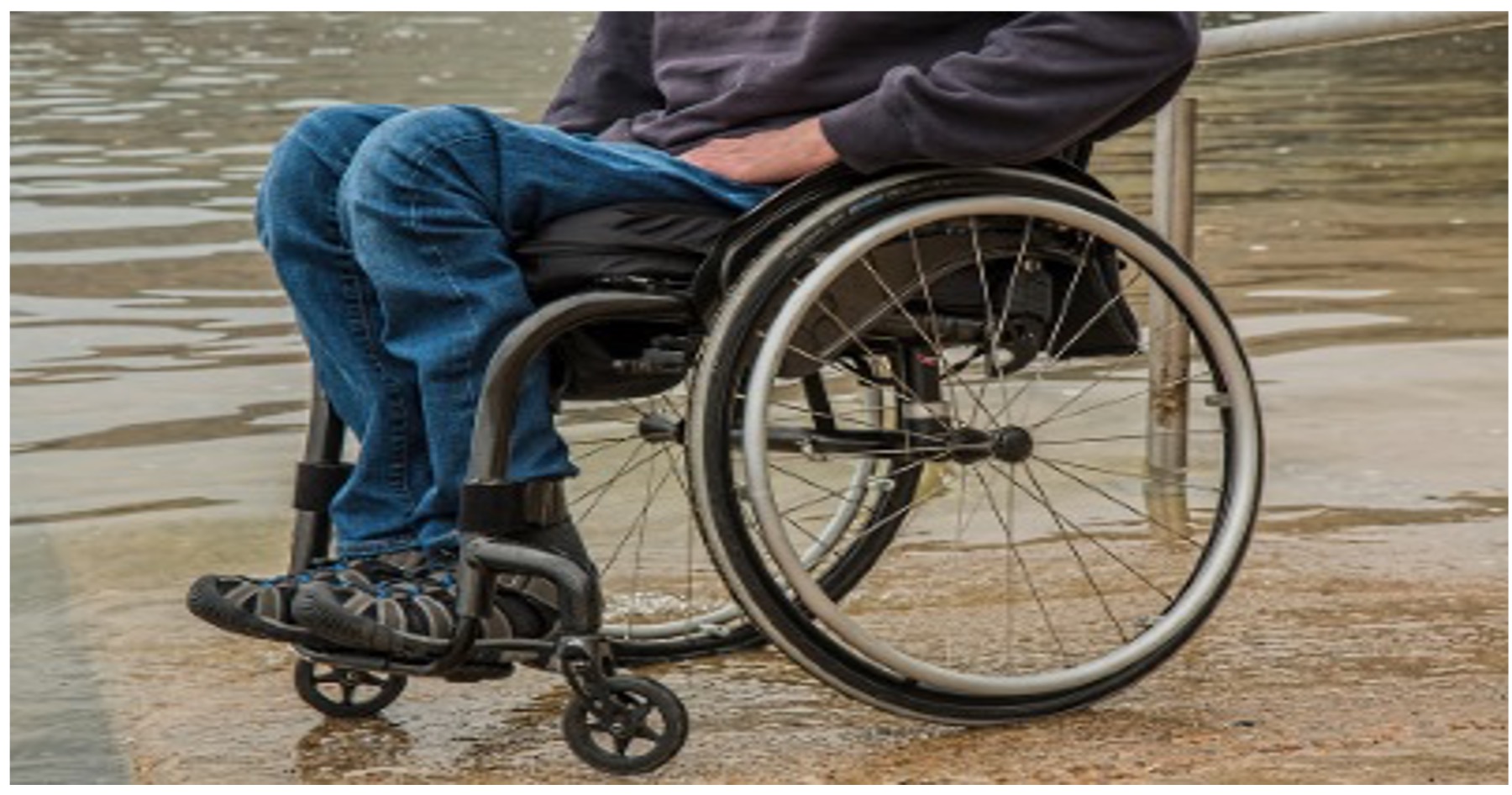 Image of a person sitting in a wheelchair